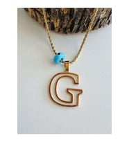 GOLD RENK NAZAR BONCUKLU G HARF ÇELİK KOLYE ACR6233