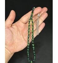 TOZ KEHRİBAR TESBİH YEŞİL/ŞEFFAF RENKLİ BEYZİ KESİM 10MMX7MM T-605 (Çok Renkli)