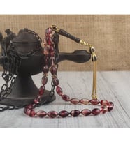 ZİRKON TAŞLI GÜMÜŞ PÜSKÜLLÜ SIKMA KEHRİBAR TESBİH (Sarı)