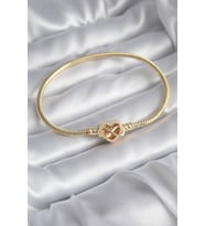 Pirinç Gold Renk Zirkon Taşlı Kalp Sonsuzluk Model Charm Kadın Bileklik