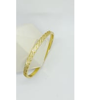 Twist Elegance – Burgu Taşlı Gold Kelepçe