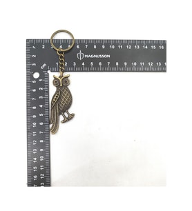 KUŞ FİGÜRÜ İLE İLGİLİ ANAHTARLIK (Metal)