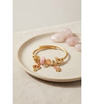 Pembe Uçan Model Charmlı Gold Renk Bileklik