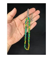 TOZ KEHRİBAR TESBİH YEŞİL RENKLİ BEYZİ KESİM 11MMX7,5MM T-668 (Çok Renkli)