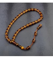 Sistem Püsküllü 10x7 mm Sıkma Kehribar Tesbih