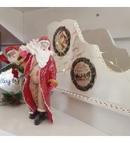Kırmızı Paltolu Noel Baba
