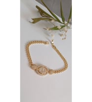 ÇELİK BİLEKLİK XUPİNG ALTIN KAPLAMA DORİKA 14 AYAR GOLD RENK GARANTİLİ KUYUMCU MODEL 18 CM