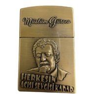 MÜSLÜM GÜRSEL Kabartma Figürlü Sarı Metal Gazlı Çakmak (Sarı Altın)