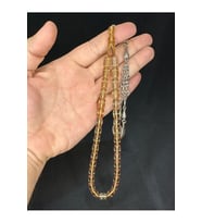 SEVGİLİYE ÖZEL HEDİYE TOZ KEHRİBAR TESBİH BEJ RENKLİ KAPSÜL KESİM 11MMX7,5MM H-1570.
