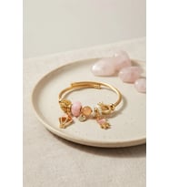 Pembe Uçan Model Charmlı Gold Renk Bileklik