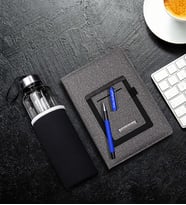 Kişiye Özel Mavi Roller Kalem & Telefon Cepli Gri Defter & Özel Kılıflı 500Ml Cam Matara Hediye Seti