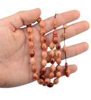 Özel Seri İmzalı Sistem Püsküllü 11x8.5 mm Arpa Kesim Sıkma Kehribar Tesbih