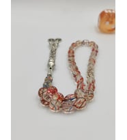 USTA İŞCİLİKLİ ŞEFFAF ÇİZĞİLİ ATEŞ KEHRİBAR TESBİH 8 * 12 MM ARPA KESİM GÜMÜŞ KAPLAMA PÜSKÜL