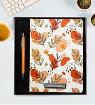 Kişiye Özel Co Notes Marka Beyaz Renk Turuncu Çiçek ve Yaprak Modelli Kareli Defter & Turuncu Renk Metal Kalem Premium Hediye Seti