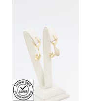 STİL İNCİSİ/XUPING JEWELRY YAPRAK SALLANTILI ZİRKON TAŞLI KÜPE (Altın Rengi)