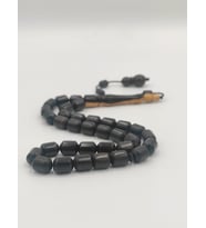 USTA İŞCİLİKLİ ABANOZ AĞACI TESBİH 8 * 12 MM KAPSÜL KESİM  TAKIMLI SİSTEMLİ PÜSKÜL (E.Siyah)