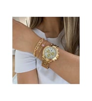 bayan gold renk  çelik  kasa analog kol saati