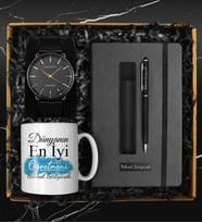 Öğretmenler Gününe Özel Dünyanın En İyi Öğretmeni Kupası & Kişiye Özel Defter & Deri Kılıflı Touch Pen Kalem & Hasır Kordon Saat