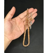 SIKMA KEHRİBAR TESBİH KOYU KREM RENKLİ KAPSÜL KESİM 11,5MMX7,5MM T-608 (Çok Renkli)