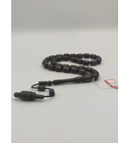 USTA İŞCİLİKLİ KORDİKEN AĞACI TESBİH 8 * 12 MM KAPSÜL KESİM TAKIMLI SİSTEMLİ PÜSKÜL (E.Siyah)