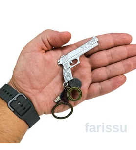 Metal Tabanca Tasarımlı Anahtarlık  Şık & Fonksiyonel Aksesuar