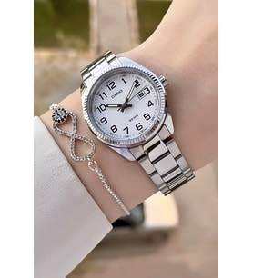 Casio CSISTE173 Kadranı Beyaz Kordonu Metalik Renk 2 Yıl Garantili Kadın Kol Saati