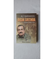 BIÇAK SIRTINDA