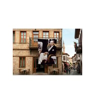 Koltukta Oturan Atatürk- Takım Elbiseli Atatürk Poster Bayrak Premium Raşel Kumaş 300x450cm ATA25
