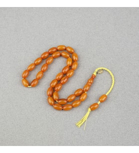 Omari Sıkma Kehribar Beyzi Kesim Sistemli 7.5x12mm Tesbih