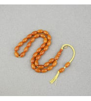 Omari Sıkma Kehribar Beyzi Kesim Sistemli 7.5x12mm Tesbih