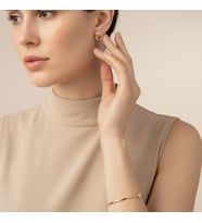 STİL İNCİSİ/XUPING JEWELRY DALGA MODEL ZİRKON TAŞLI KÜPE