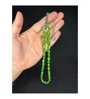 TOZ KEHRİBAR TESBİH YEŞİL GÜMÜŞ RENKLİ BEYZİ KESİM 10MMX6,5MM T-675