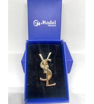 gold ysl broş