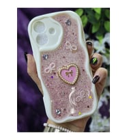 Iphone 16 Uyumlu Kalpli Pembe Simli İnci ve Kurdele Detaylı Şık Telefon Kılıfı