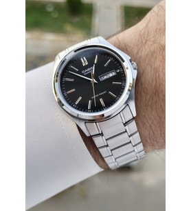 Casio CSISTE94 Kadranı Siyah Kordonu Gümüş Renk Gün ve Takvim Fonksiyonlu Hediye Paketli Erkek Kol S