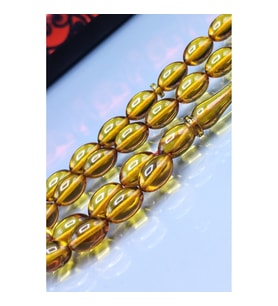 7x11 mm Mustafa Uysal İmzalı Altın Rengi Ateşi Kehribar Tesbih