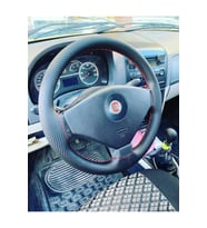 DİKİŞLİ DİREKSİYON KILIFI KARBON DERİ KIRMIZI DİKİŞLİ FIAT ALBEA İÇİN HIZLI KARGO