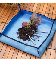 Lexroo Çiçek saksı toprağı aktarımı için su geçirmez ped 50x50 cm 1 adet mavi
