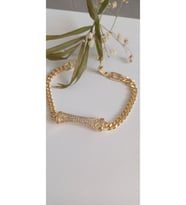 ÇELİK BİLEKLİK KADIN GOLD BAGET TAŞLI ALTIN KAPLAMA  ANTİALERJİK KARARMAZ 17 CM