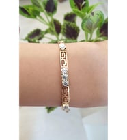 ÇELİK BİLEKLİK XUPİNG KARE TEK  TAŞLI 14 AYAR GOLD RENGİNDE SAVOROSKİ TAŞLI 17+2 CM FMACCESORİES