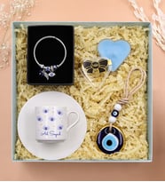 Kişiye Özel Nazar Boncuğu Baskılı Fincan & Gümüş Renk Charm Çelik Bileklik & Nazar Boncuklu Duvar Süsü & Kalp Mum Hediye Seti