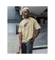 Life is Holy Baskılı Oversize Erkek Tişört – Kutsal Yaşam Tasarımı (Bej)