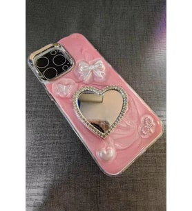 Caş Dekorasyon Pembe Renk Kalp Ve Kurdele Figürlü Aynalı 15 Pro Max Telefon Kılıfı