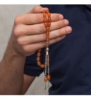 Metal Püsküllü 7x11 mm Turuncu Sıkma Kehribar Tesbih