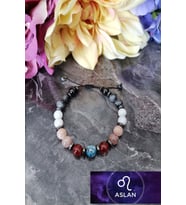 8 MM ASLAN BURCU DOĞAL TAŞ BİLEKLİK (AKİK, HEMATİT,ONİKS, LABRADORİT,AY TAŞI, GÜNEŞ TAŞI, DUMORTİREİT)