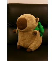 🐾 Sevimli Capybara Peluş Oyuncak – Yumuşacık Sarılma Arkadaşı & Dekoratif Yastık (26x25x19 cm) (Bej)