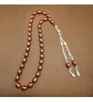 Sıkma Kehribar Tesbih Özel İşçilik Gümüş Renk Çelik Püskül Şıklığı Tamamlayan Manevi Bir Dokunuş (Kahverengi)
