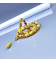 9x11 mm Tıraşlı Ebu Sırr İmzalı Zar Kehribar Tesbih