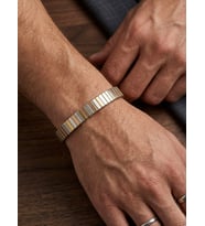 Modern Gümüş ve Gold Detaylı Esnek Çelik Bileklik – Minimalist Unisex Tasarım