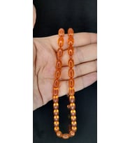 ATEŞ KEHRİBAR TESBİH PEMBE RENKLİ BEYZİ KESİM T-383 (Çok Renkli)